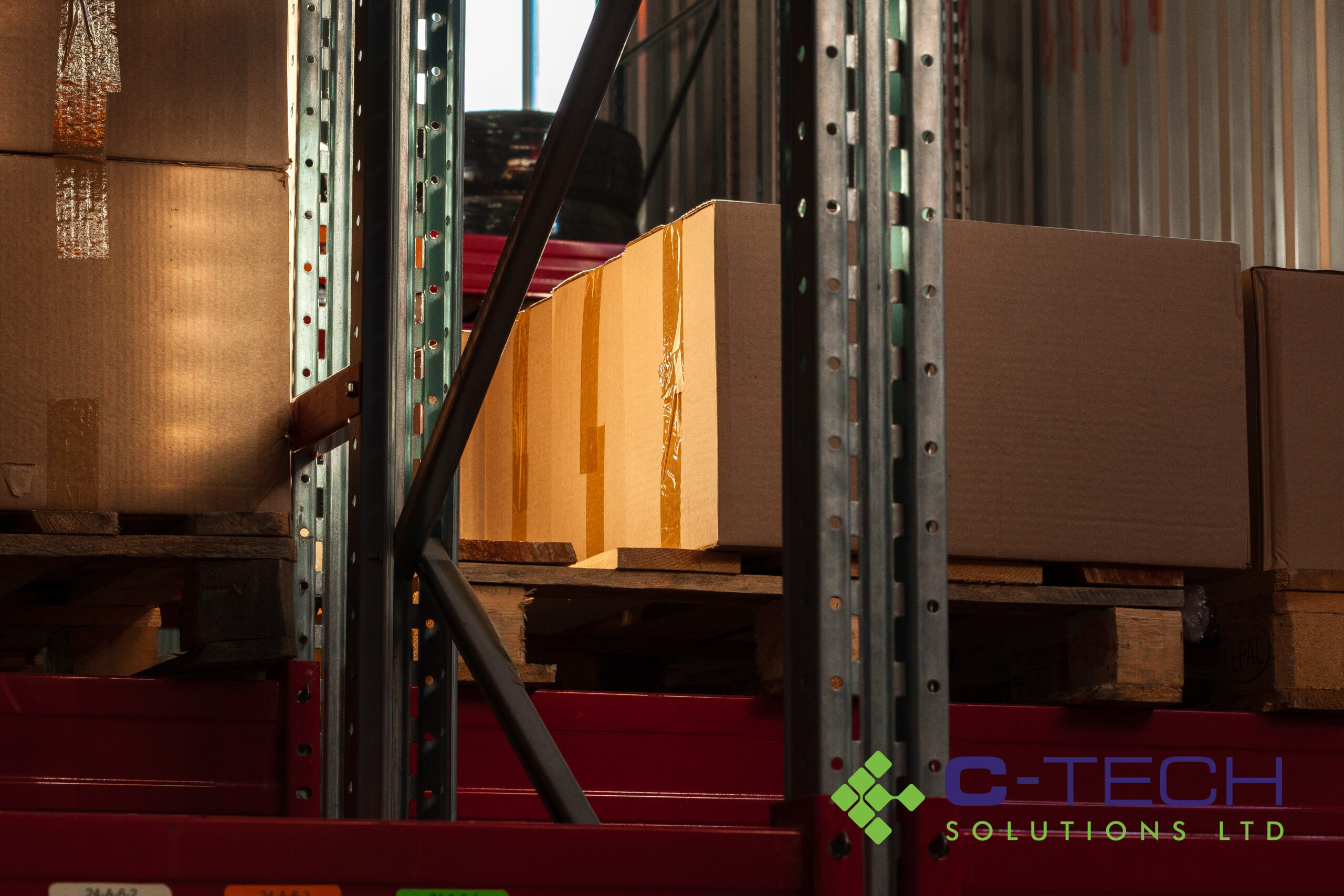 modern-warehouse-shelves-with-pile-of-cardboard-bo-2025-02-24-12-45-17-utc